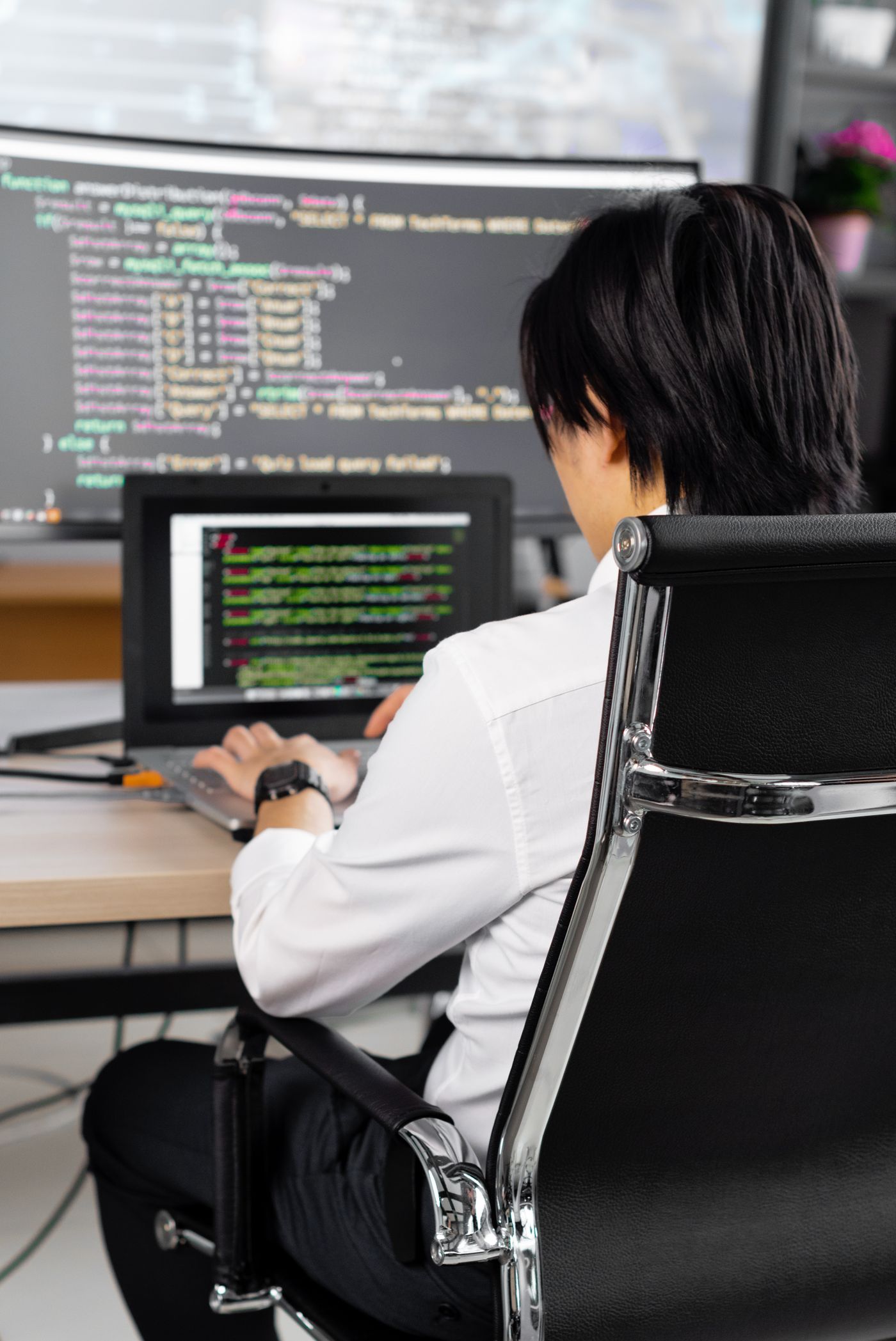 A software engineer working across code and product systems